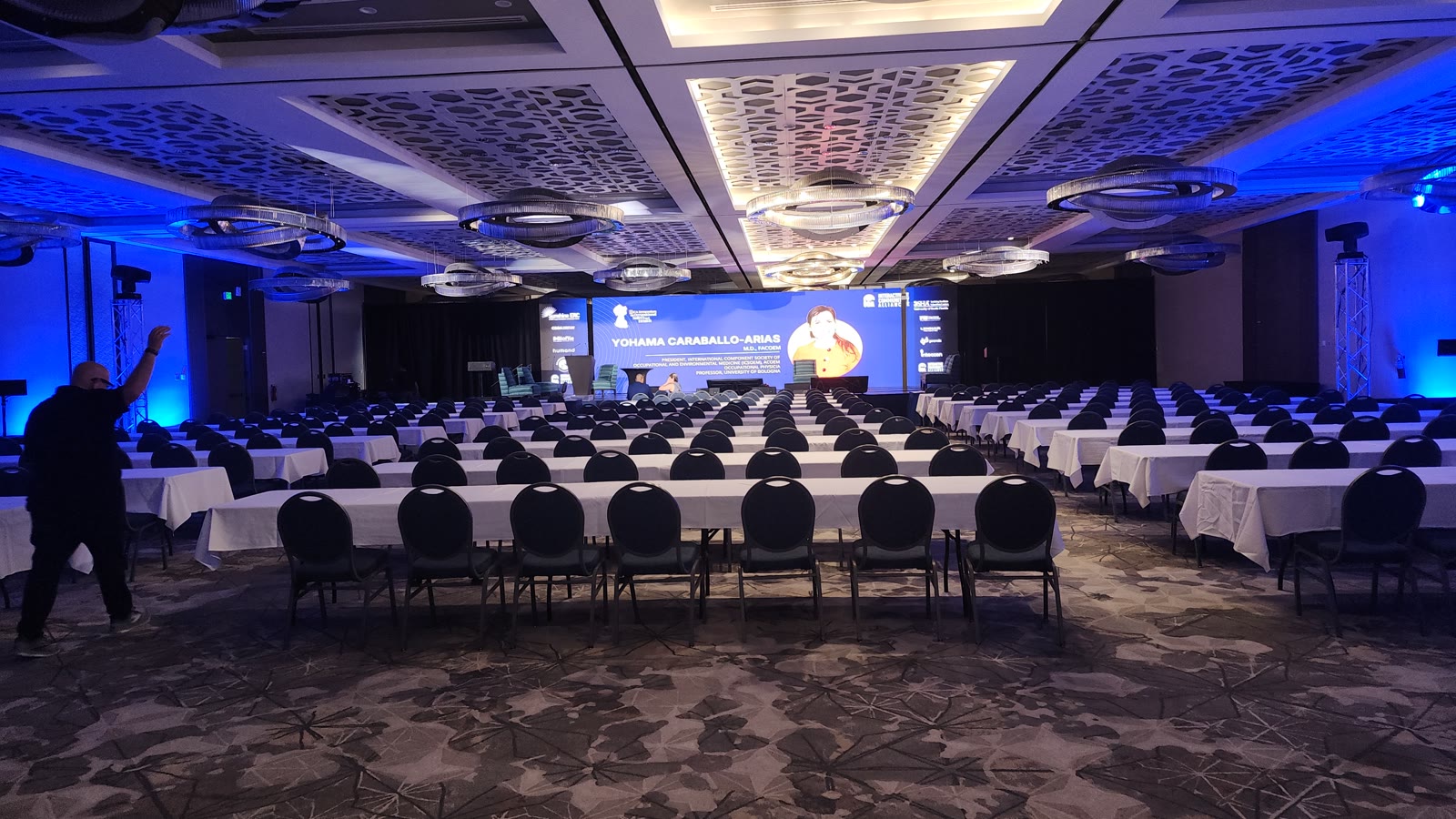 II ICA Symposium 2026 ballroom with black stage backdrops and the presentation area prepared.