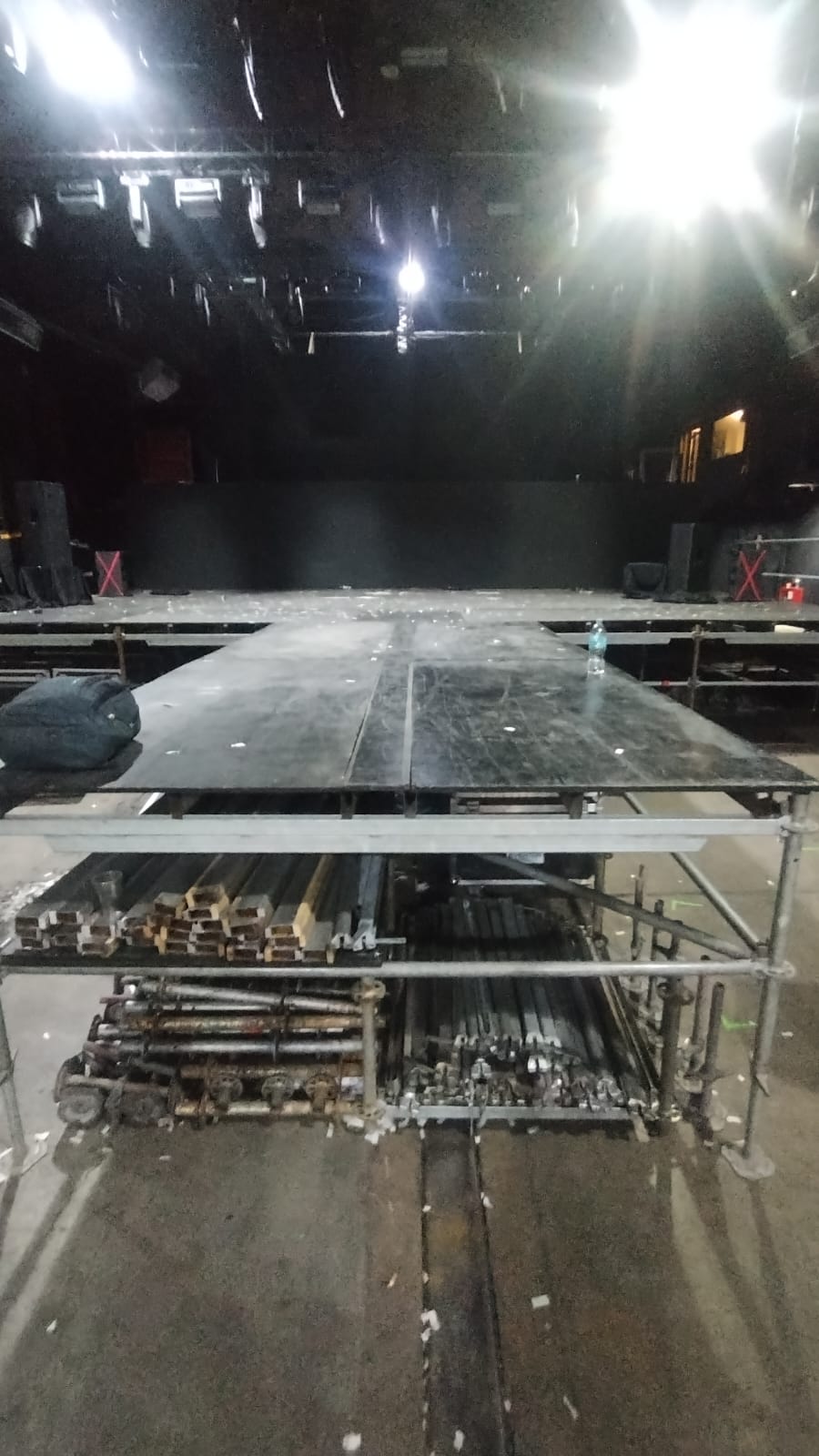 Central thrust and front stage extension during assembly, with supporting structure visible.